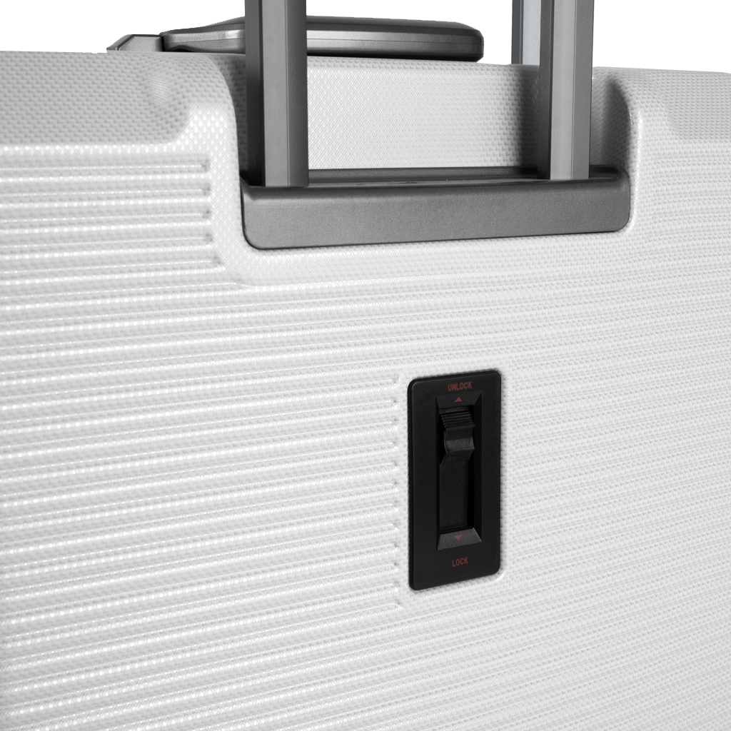 Vali có chức năng khóa bánh xe chống trôi, nút khóa đặt ở mặt lưng của vali